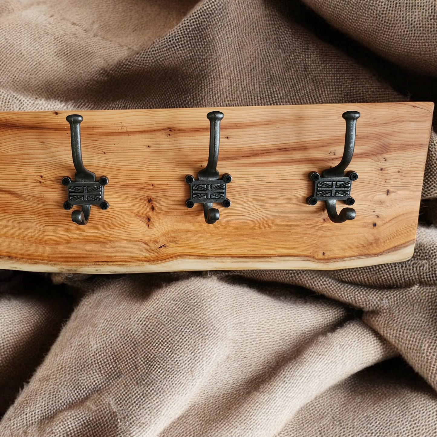 Live edge yew coat hook with Union Jack style hooks