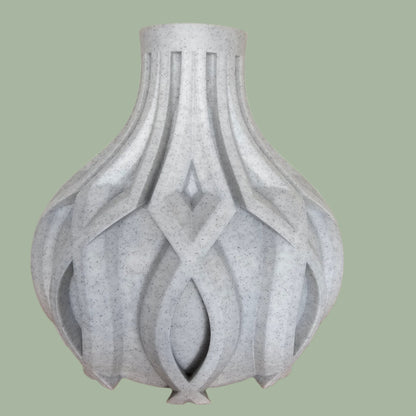 3D printed vase with raised detail in a stone filament