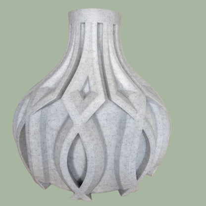 3D printed vase with raised detail in a stone filament