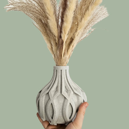 3D printed vase with raised detail in a stone filament