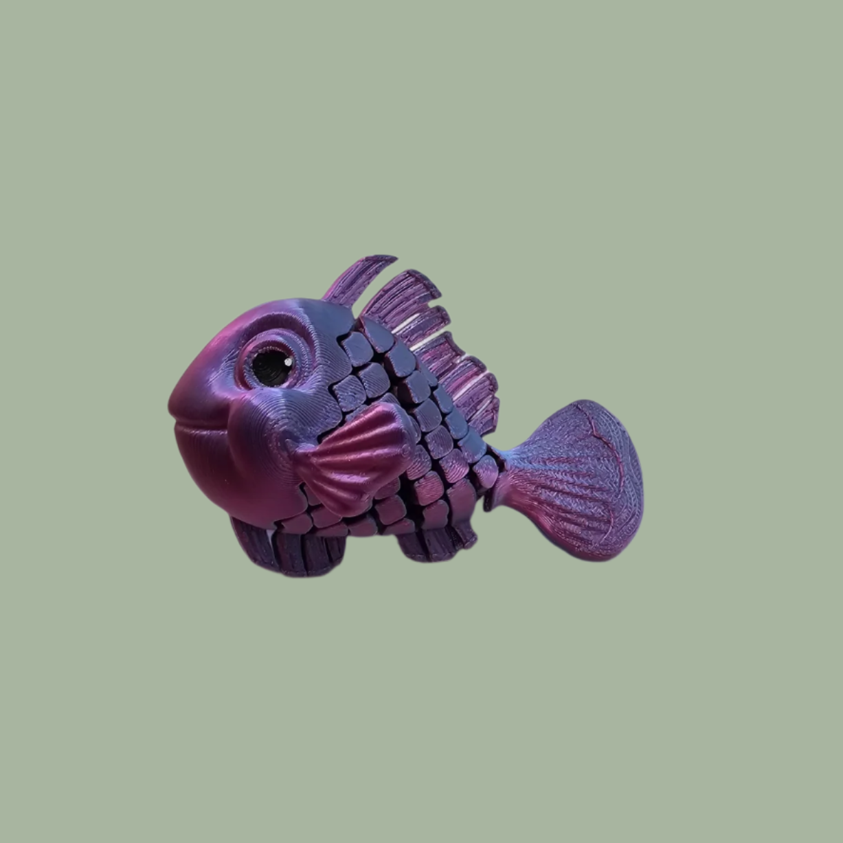 3D printed articulated fish in a random shiny colour