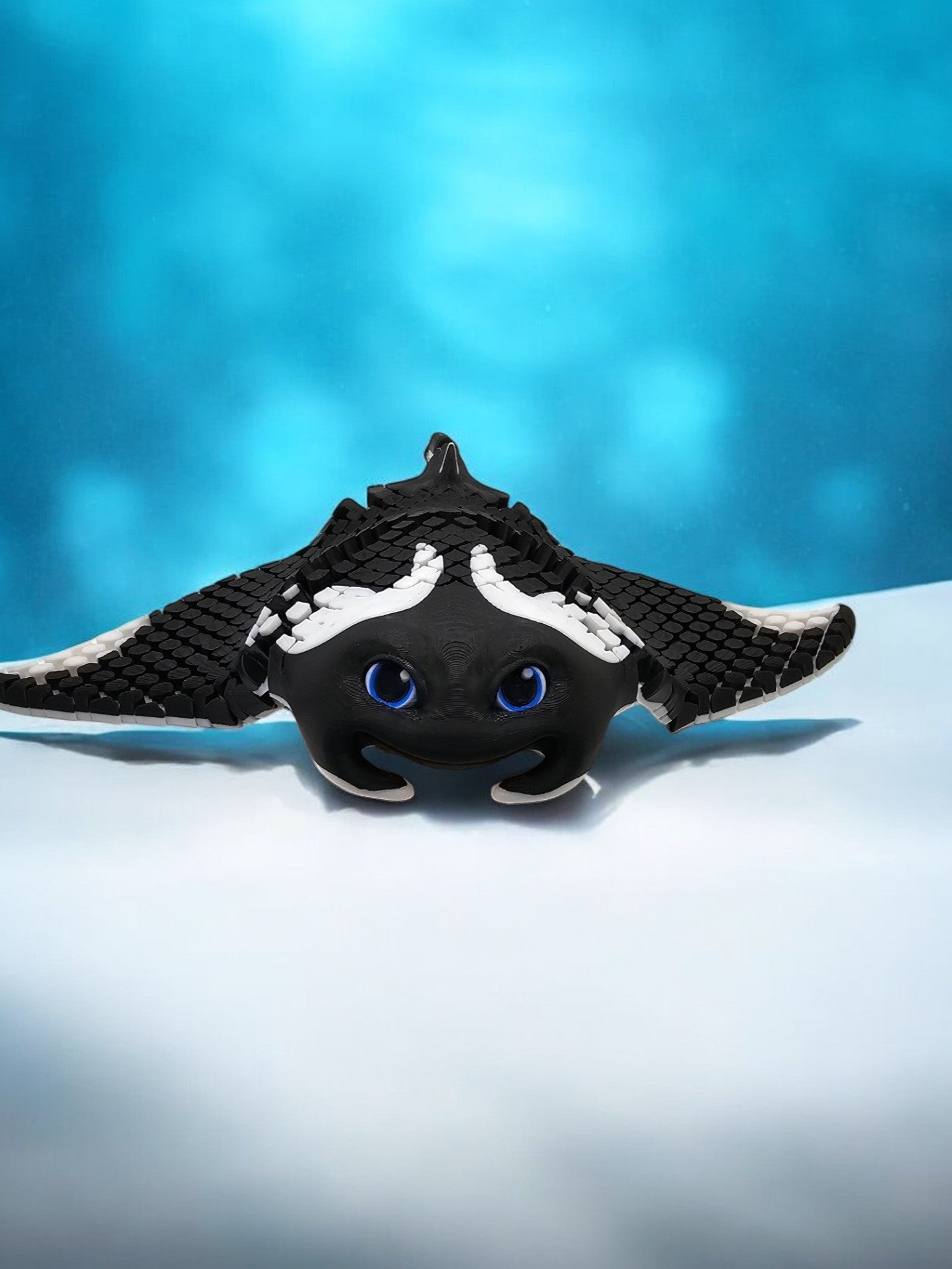 3D printed manta ray with mesh articulated body in white and black