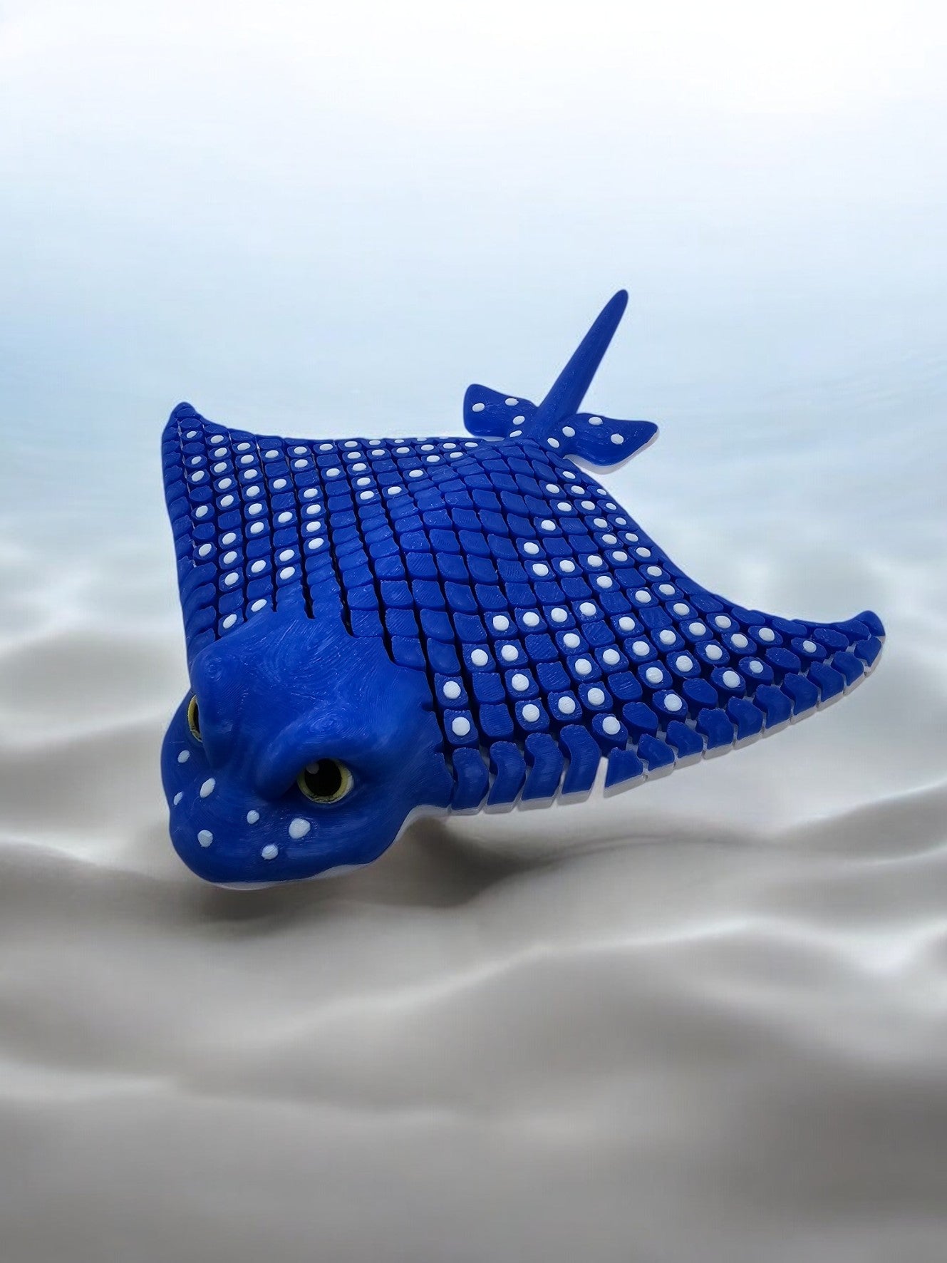 3D printed stingray with mesh articulated body, blue with white spots