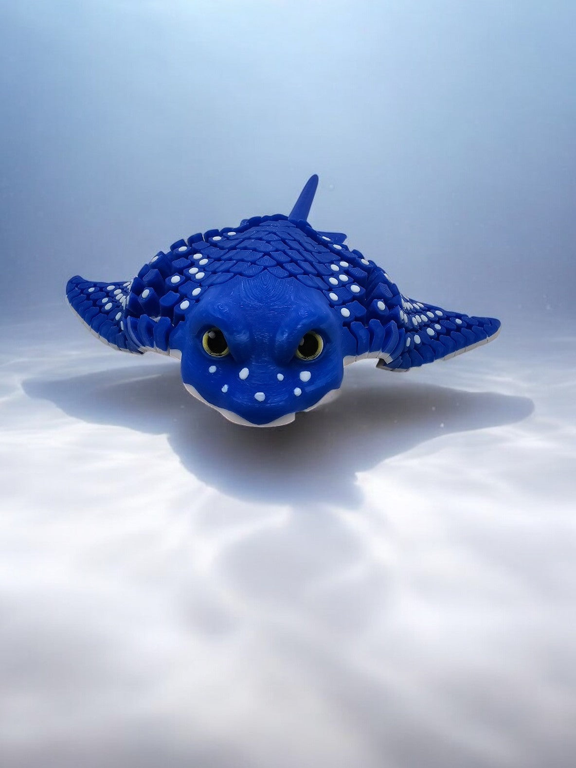 3D printed stingray with mesh articulated body, blue with white spots