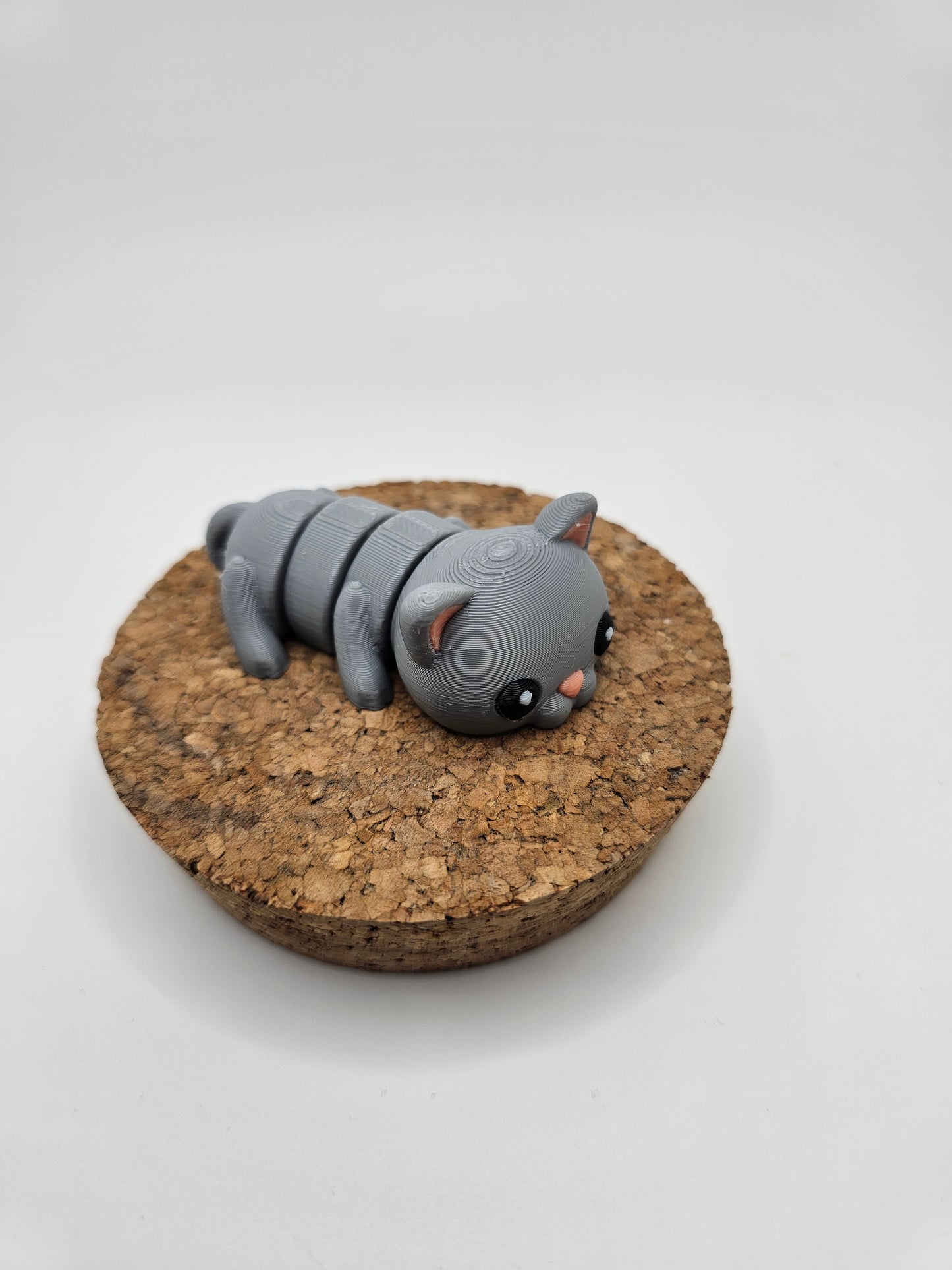 3D printed grey cat articulated fridge magnet