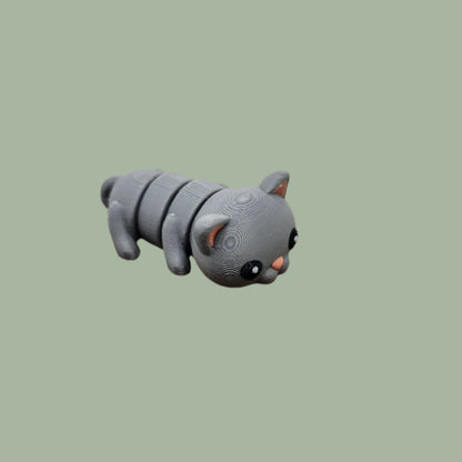 3D printed grey cat articulated fridge magnet