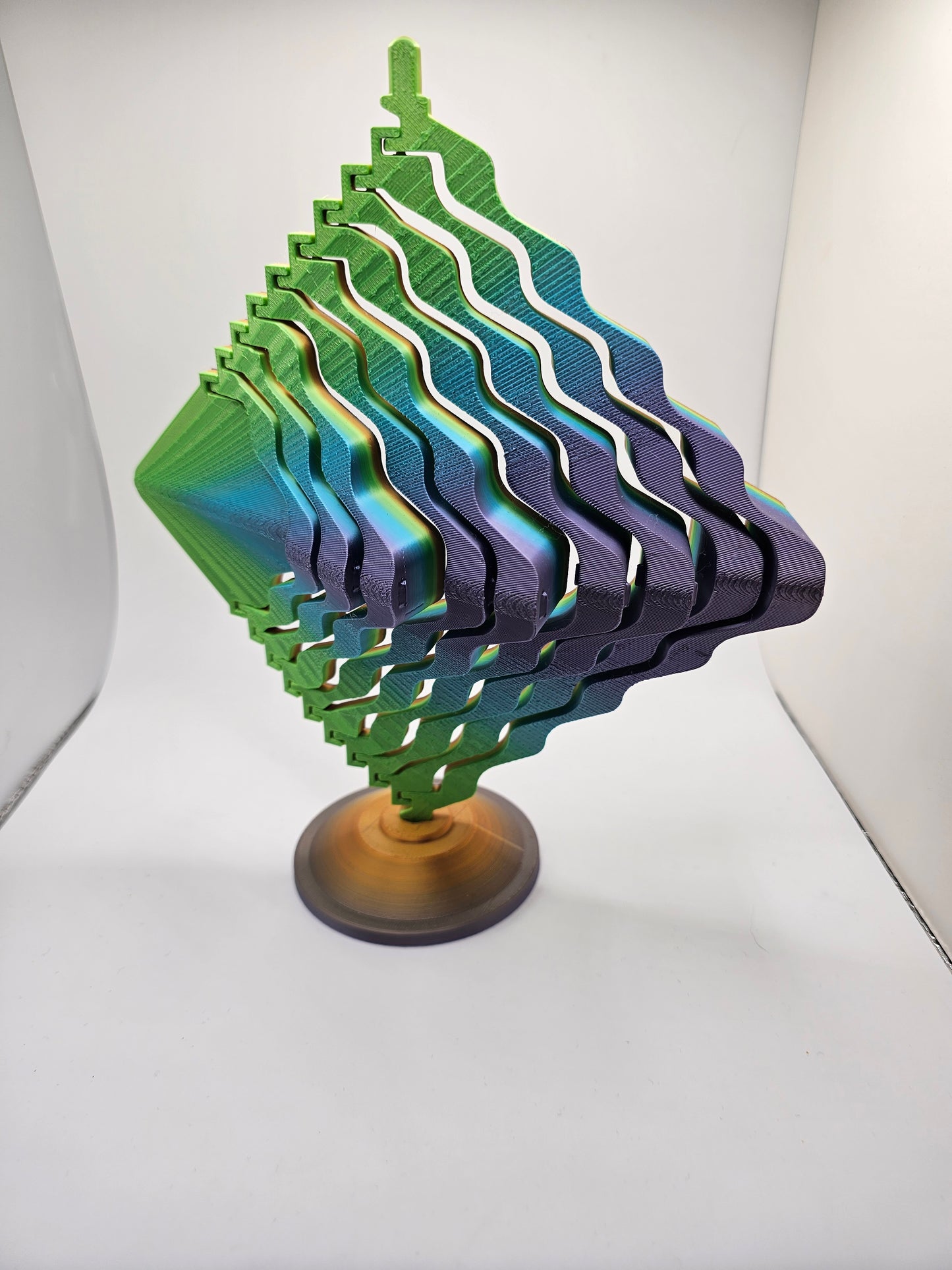 3D printed moveable kinetic art on a gold base