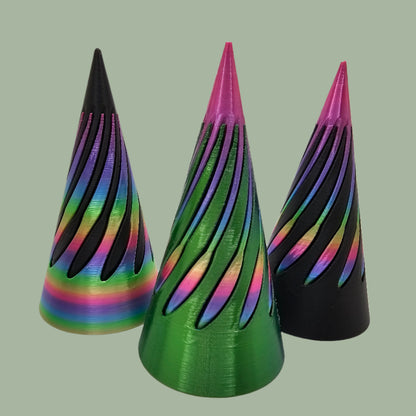 vibrant 3D-printed Infinity Cones V2, each featuring a sleek spiral cut design. The cones are in a random colour, including white, green, black, and rainbow gradients. Designed for smooth sliding and fidgeting, these eye-catching desk toys are handmade in the UK