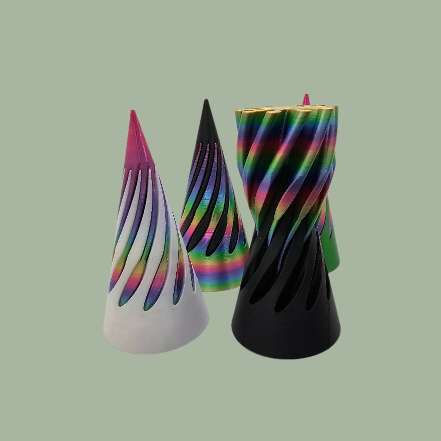 vibrant 3D-printed Infinity Cones V2, each featuring a sleek spiral cut design. The cones are in a random colour, including white, green, black, and rainbow gradients. Designed for smooth sliding and fidgeting, these eye-catching desk toys are handmade in the UK