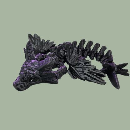 3D printed articulated axolotl dragon in a purple/black colour