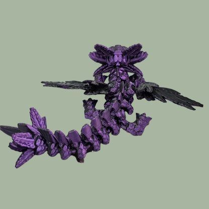 3D printed articulated axolotl dragon in a purple/black colour