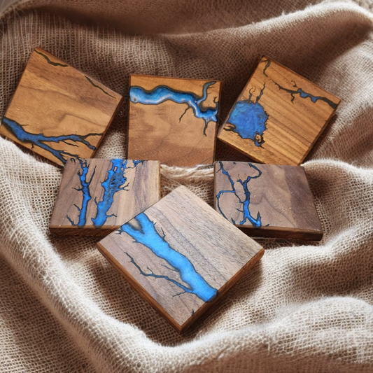 Solid wood coasters with electrocuted detail infilled in resin in a choice of colours