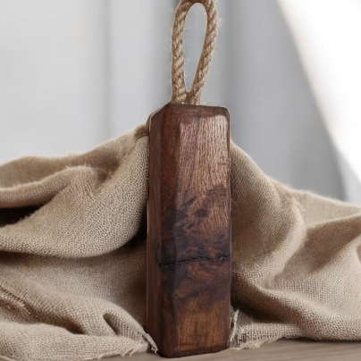 Solid wood doorstop with rustic rope handle