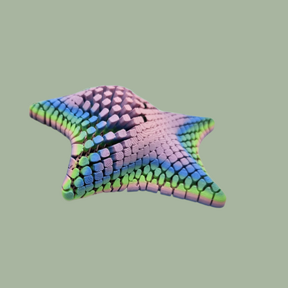 3D printed mesh articulated starfish with black eyes in a pastel rainbow colour