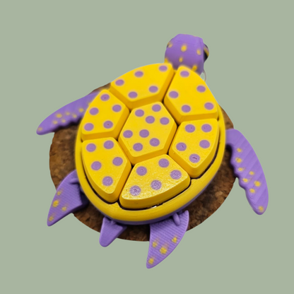 3D printed fruit turtle clicker, with 7 buttons, flexi flippers, in the style of a passionfruit