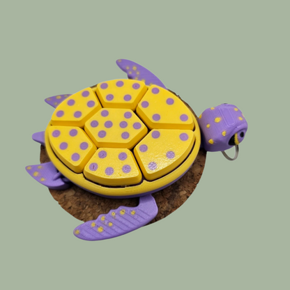 3D printed fruit turtle clicker, with 7 buttons, flexi flippers, in the style of a passionfruit