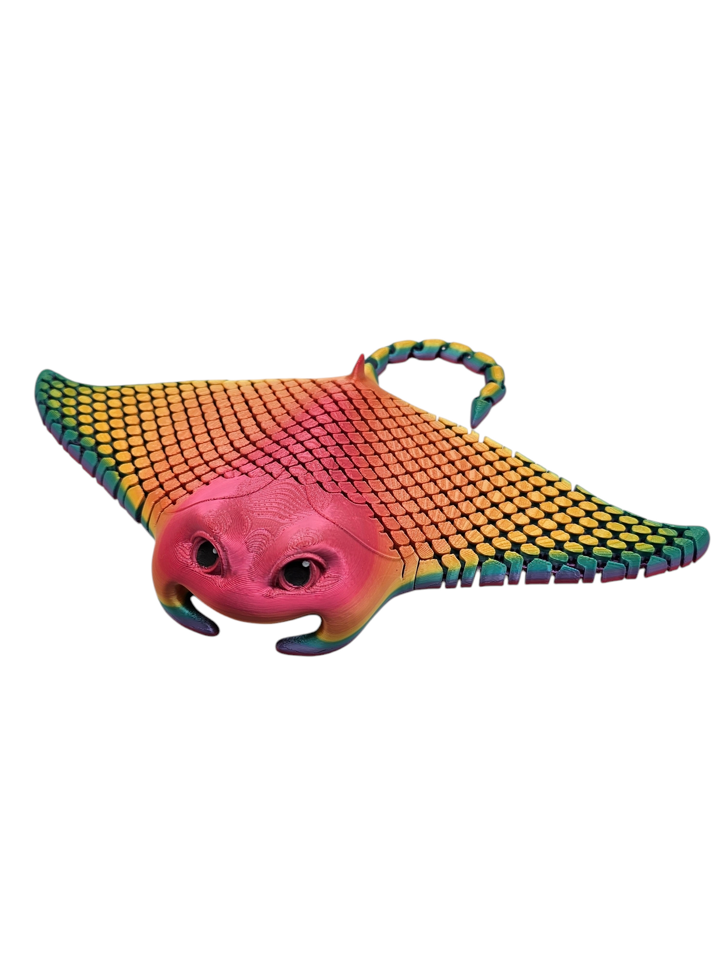 3D printed manta ray with mesh articulated body in a candy rainbow colour