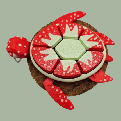 3D printed fruit turtle clicker, with 7 buttons, flexi flippers, in the style of a strawberry