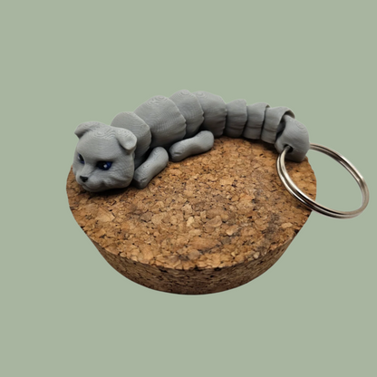 Grey articulated cat keyring with folded ears